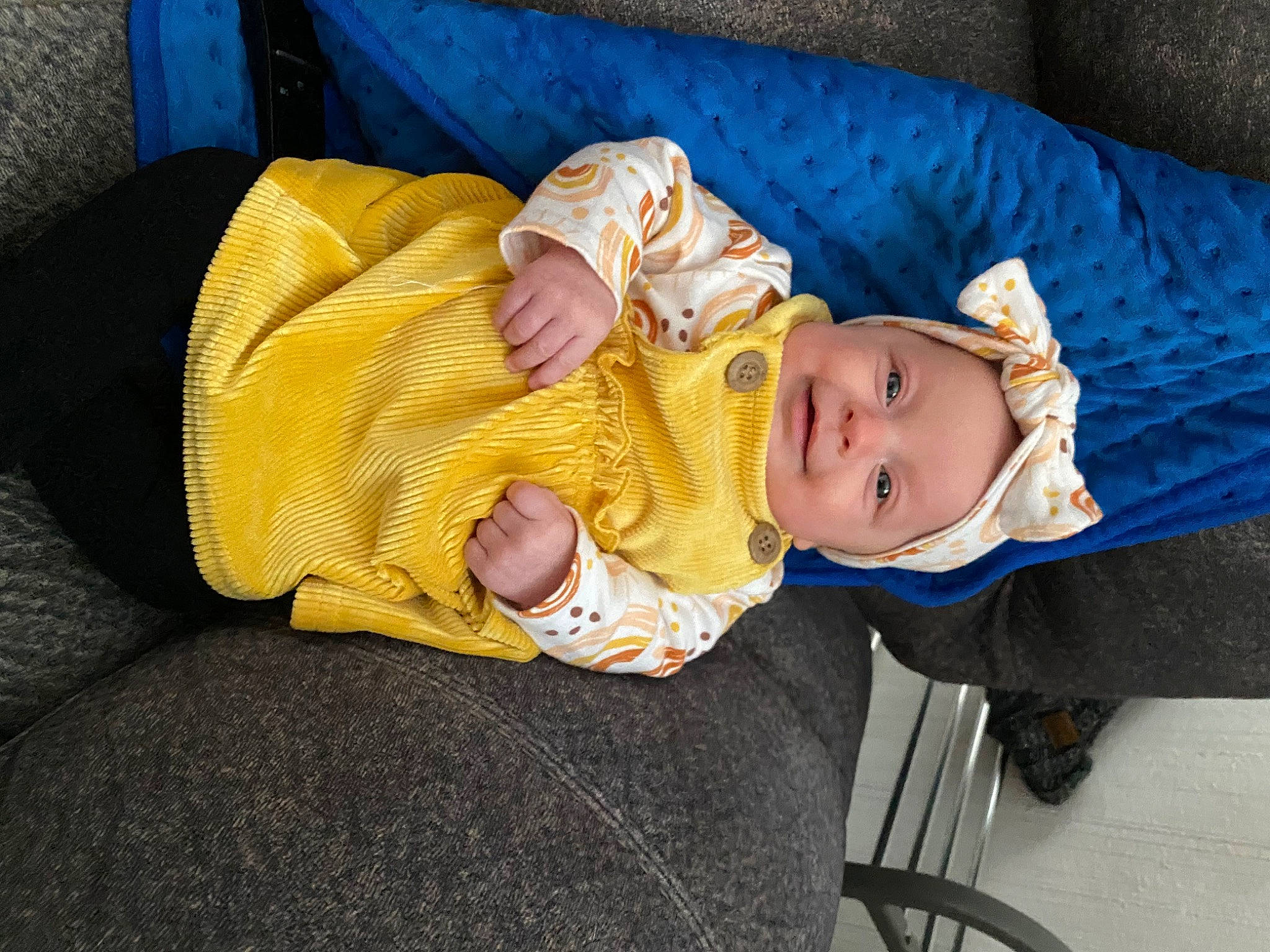 Adalyna is registered to the contest to win money with this photo: baby, baby_carriage, baby_products, baby_safety, baby_toddler_clothing, cheek, child, comfort, hat, headwear, lap, nap, person, sitting, sleep, smile, tire, toddler, tree, wheel