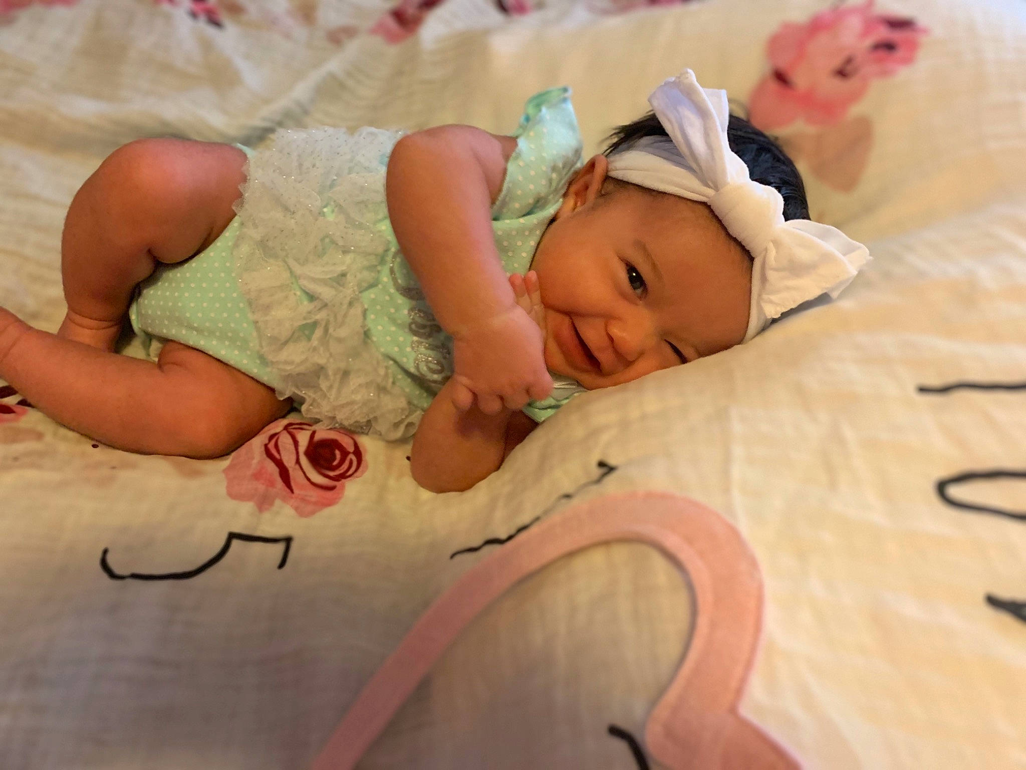 Charleigh joined the competition — help win amazing prizes! baby, baby_sleeping, baby_toddler_clothing, bedding, bedtime, cheek, child, comfort, event, fashion_accessory, finger, hair_accessory, happy, hat, headwear, human_body, linens, person, skin, thumb