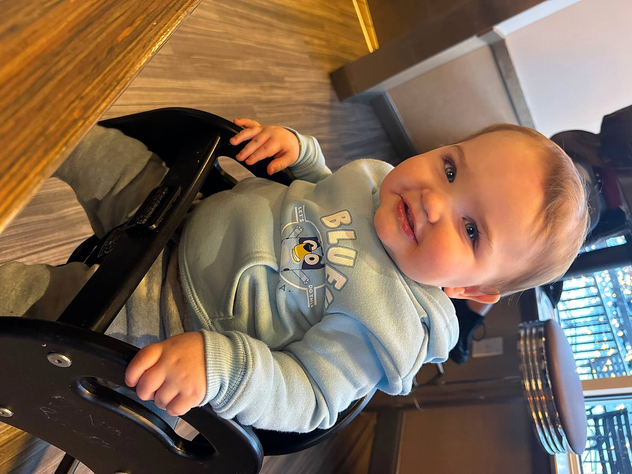 Malakai is registered to the contest to win money with this photo: auto_part, automotive_design, automotive_exterior, baby, baby_products, baby_toddler_clothing, car_seat, child, comfort, electric_blue, fun, joy, luxury_vehicle, person, personal_luxury_car, sitting, smile, toddler, travel, vehicle_door