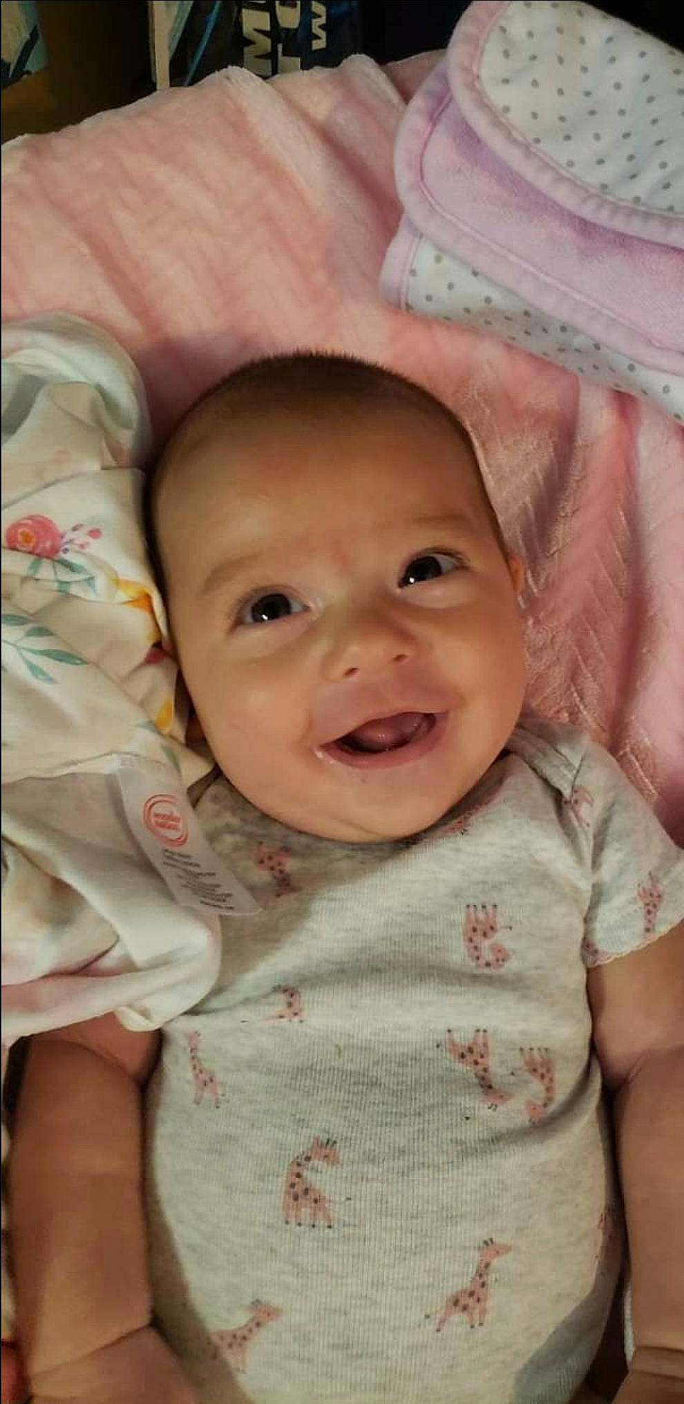 Phoebe joined the competition — help win amazing prizes! baby, cheek, child, chin, eye, face, facial_expression, forehead, head, iris, lip, mouth, nose, person, pink, skin, smile, toddler