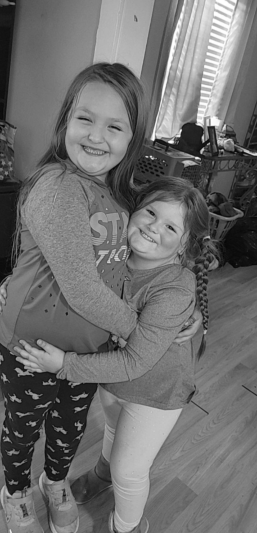 Maleah is registered to the contest to win money with this photo: black, black_and_white, eye, face, facial_expression, flash_photography, gesture, hair, hairstyle, happy, head, iris, joy, mammal, organ, person, photograph, shoulder, skin, smile