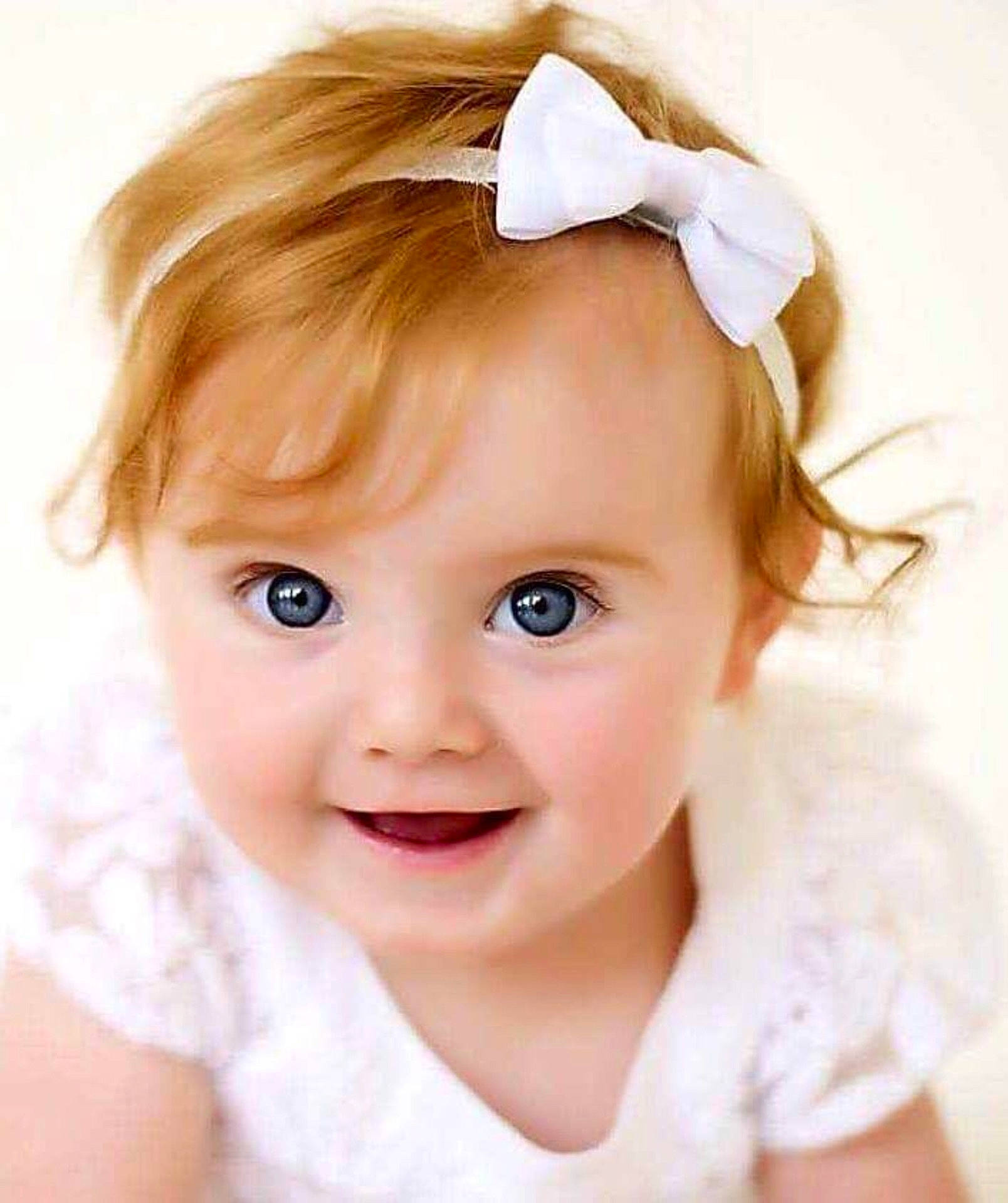 Mary-elizabeth is registered to the contest to win money with this photo: brown_hair, cheek, child, child_model, ear, eyebrow, forehead, girl, hair_accessory, hair_coloring, hair_tie, hairstyle, headpiece, infant, joy, person, smile, toddler