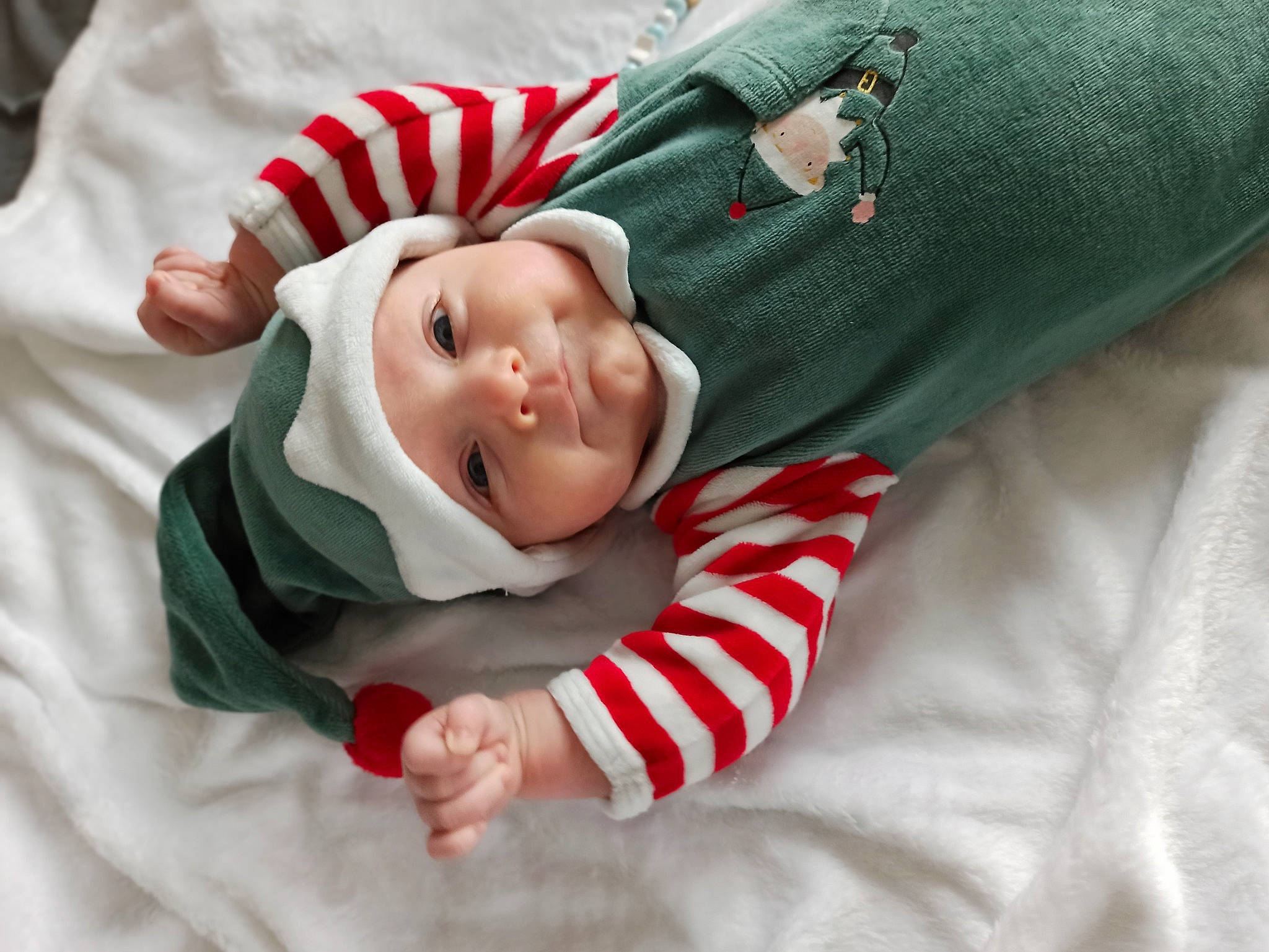 Aurèle participe au concours pour gagner de l'argent avec cette photo : baby, baby_products, baby_sleeping, baby_toddler_clothing, carmine, cheek, child, comfort, event, eye, fictional_character, gesture, happy, head, headwear, human_body, laugh, linens, person, sleeve