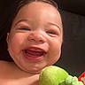 Karri joined the competition — help win amazing prizes! baby, child, infant, smiling, happy, portrait, face, close_up, indoor, couch, blanket, pink_blanket, plush_toy, frog_toy, toy, lying_down, bare_shoulders, brown_hair, laughter, cozy