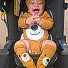 Emiliano joined the competition — help win amazing prizes! baby, infant, child, smiling, laughing, portrait, stroller, teddy_bear_costume, bear_ears, orange_clothing, onesie, matching_booties, happy, outdoor, seated, playful, toy, car_seat, close_up, adorable