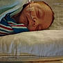baby, sleeping, blanket, nasal_tube, bed, cushion, child, infant, face, cozy, rest, healthcare, hospital, patient, peaceful, wearing, clothing, closeup, portrait, indoors