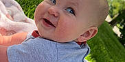 Charlie is registered to the contest to win money with this photo: baby, child, smiling, outdoor, grass, blanket, shirt, cute, happy, portrait, toddler, head, face, nature, daylight, home, candid, sitting, skin, expression