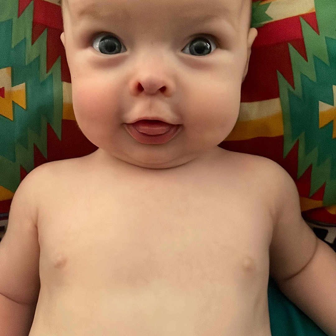 Calvin Linn is registered to the contest to win money with this photo: baby, cheek, chest, chin, eye, eyebrow, eyelash, face, forehead, hairstyle, head, iris, jaw, lip, mouth, neck, no_expression, nose, skin, toddler