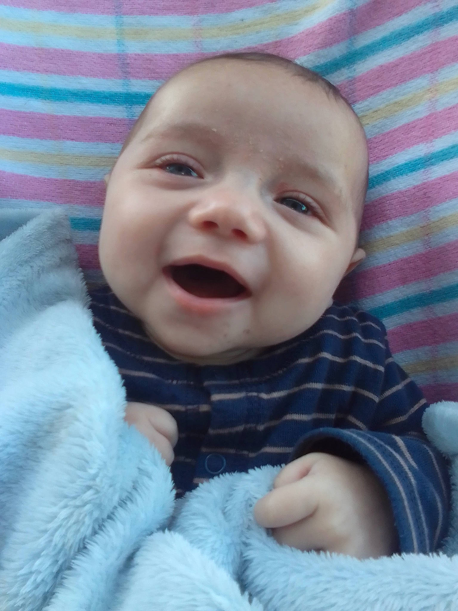 Malikai is registered to the contest to win money with this photo: baby, baby_laughing, baby_toddler_clothing, cheek, child, chin, comfort, eye, eyebrow, happy, iris, linens, lip, mouth, nose, pattern, person, skin, sleeve, smile