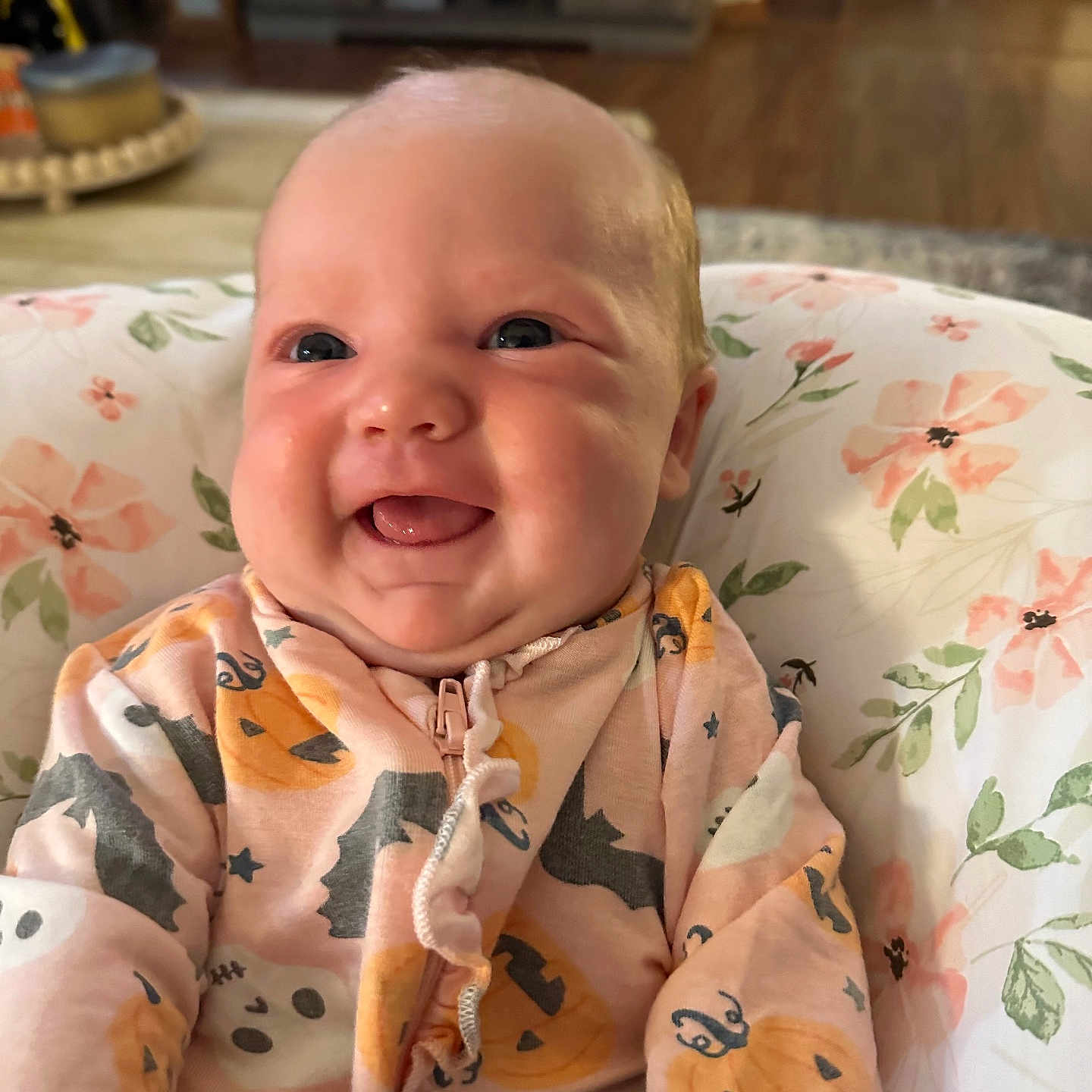 Mabry is registered to the contest to win money with this photo: accessories, baby, babylaughing, clothing, coat, face, happy, head, jacket, jewelry, laughing, necklace, newborn, pajamas, person, photography, portrait, quilt, selfie, smile