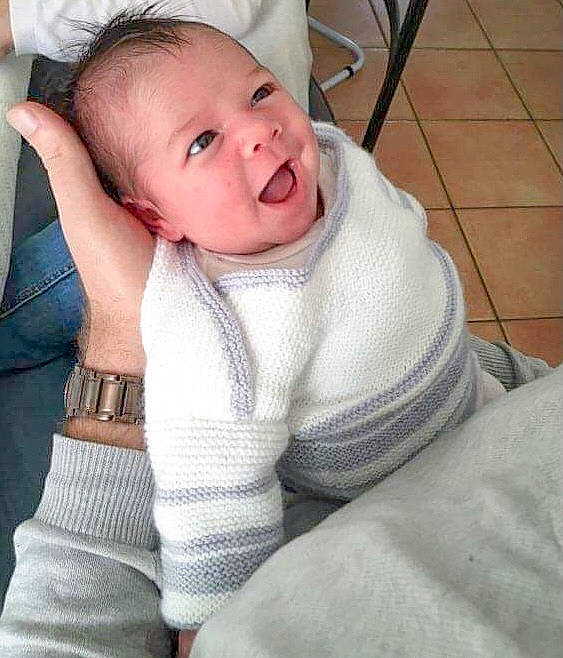 Elya a rejoint le concours — aidez-le/la à gagner de superbes lots ! baby, baby_sleeping, baby_toddler_clothing, cheek, chin, comfort, eyebrow, finger, flooring, gesture, grey, happy, iris, linens, lip, mouth, person, skin, sleeve, smile