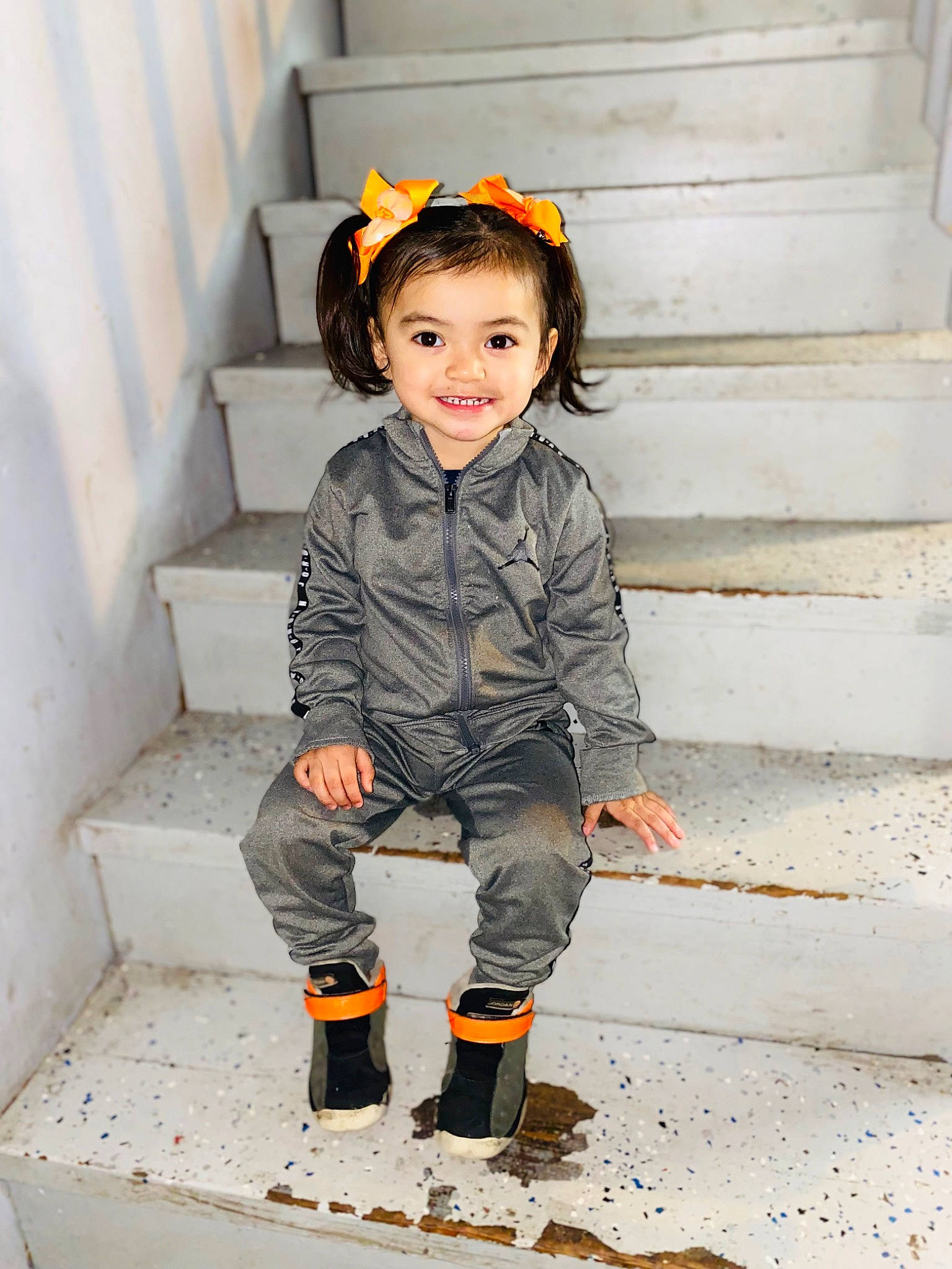 Emani is registered to the contest to win money with this photo: baby_toddler_clothing, child, eye, face, fashion_design, flash_photography, fun, hair, happy, hat, jeans, joy, orange, outerwear, pattern, person, skin, sleeve, smile, toddler