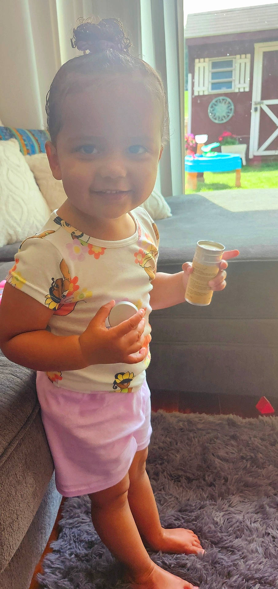 Kali is registered to the contest to win money with this photo: baby, clothing, cream, cup, cushion, cutlery, dessert, dress, face, food, furniture, head, homedecor, icecream, person, photography, portrait, shorts, spoon, t_shirt