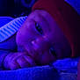 Dyvonne joined the competition — help win amazing prizes! baby, beanie, bodypart, bonnet, cap, clothing, face, finger, hand, hat, head, hood, newborn, person, purple, towel