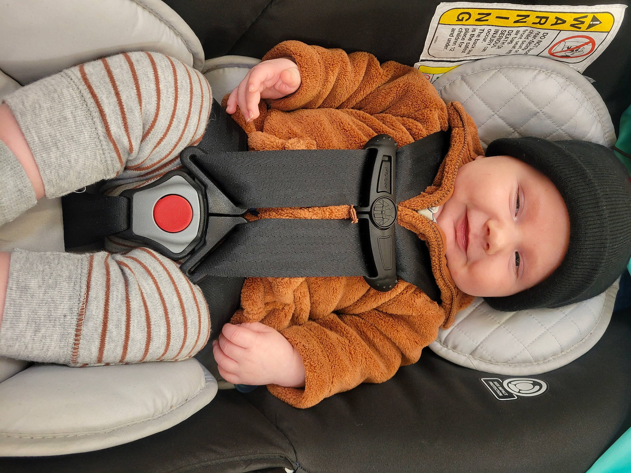 Benjamin joined the competition — help win amazing prizes! baby, baby_carriage, baby_in_car_seat, baby_products, baby_safety, baby_sleeping, baby_toddler_clothing, car_seat, cheek, child, comfort, headwear, linens, nail, nap, orange, person, sitting, sleep, sleeve