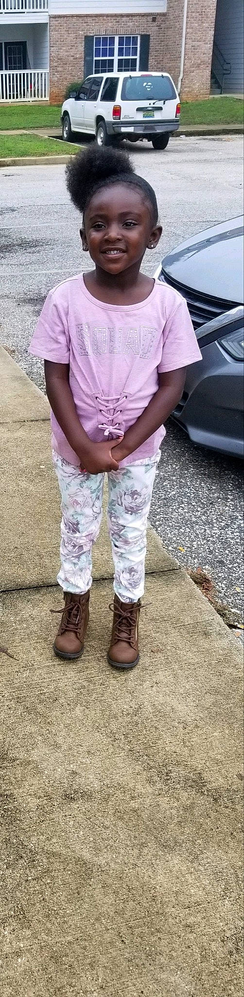 Kristen is registered to the contest to win money with this photo: boot, clothing, denim, fashion_accessory, footwear, human_leg, jeans, joy, knee, leg, leggings, outerwear, person, pink, riding_boot, shoe, sleeve, sportswear, street_fashion, t_shirt