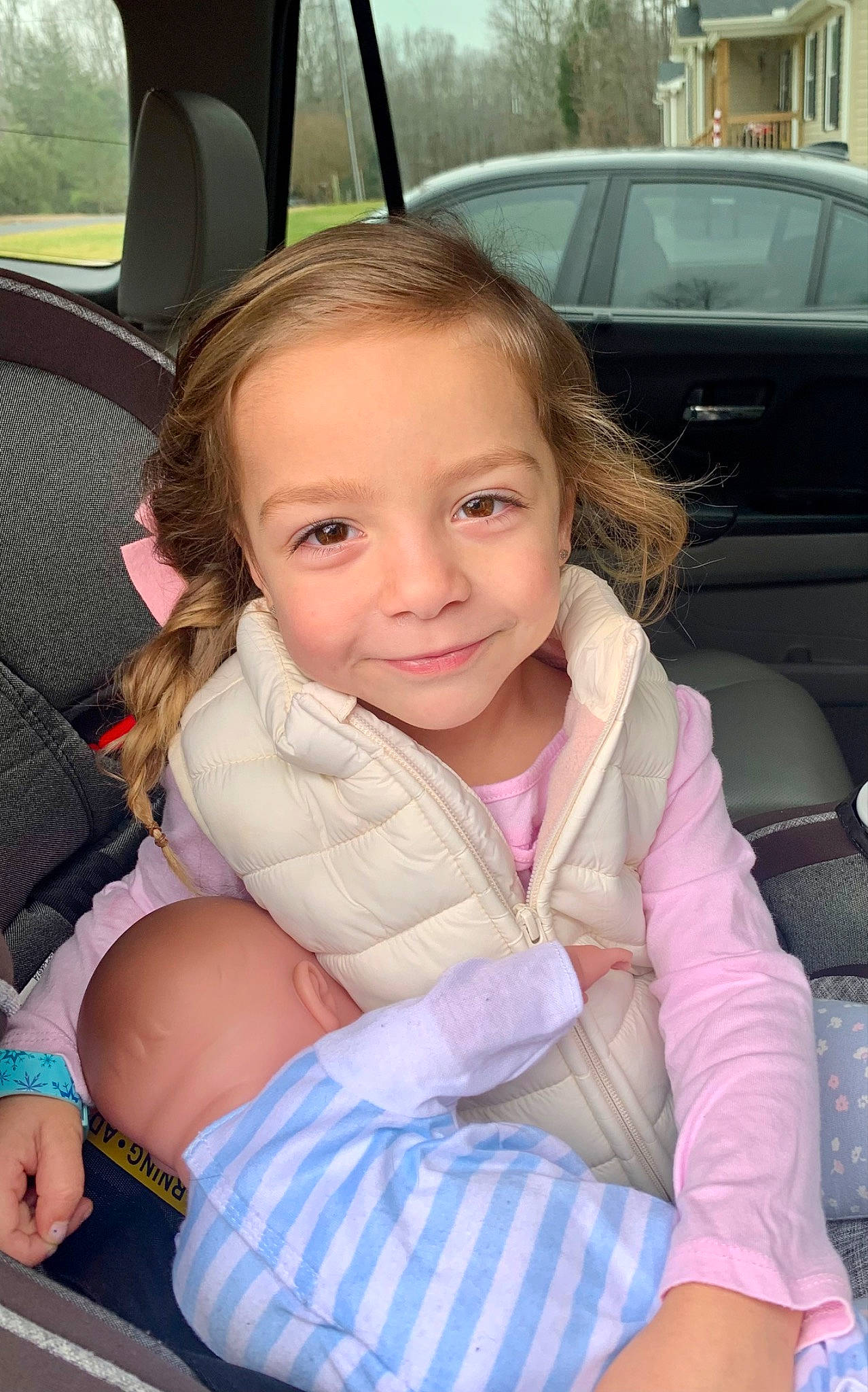 Karrigan joined the competition — help win amazing prizes! auto_part, baby_toddler_clothing, car, car_seat, car_seat_cover, cheek, chin, comfort, eye, fun, happy, joy, lap, motor_vehicle, person, pink, skin, smile, steering_wheel, thigh