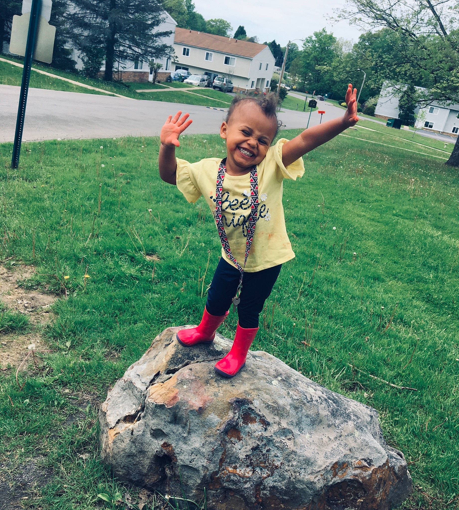 Aiyana joined the competition — help win amazing prizes! arm, child, cool, fun, grass, green, hand, happy, joy, mountain, people, person, play, rock, shoulder, sky, smile, snapshot, summer, tree