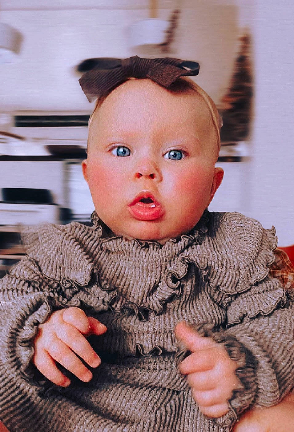 Rowey is registered to the contest to win money with this photo: baby, baby_toddler_clothing, cheek, child, chin, ear, eyelash, fashion_design, finger, flash_photography, gesture, hand, happy, iris, lip, person, skin, sleeve, surprise, thumb