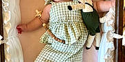 Rosemary joined the competition — help win amazing prizes! baby, bed, child, clothing, crib, cute, fabric, five_months, gazing, green_outfit, indoors, infant, milestone, person, plush_toy, portrait, resting, smiling, soft_toy, wooden_plaque