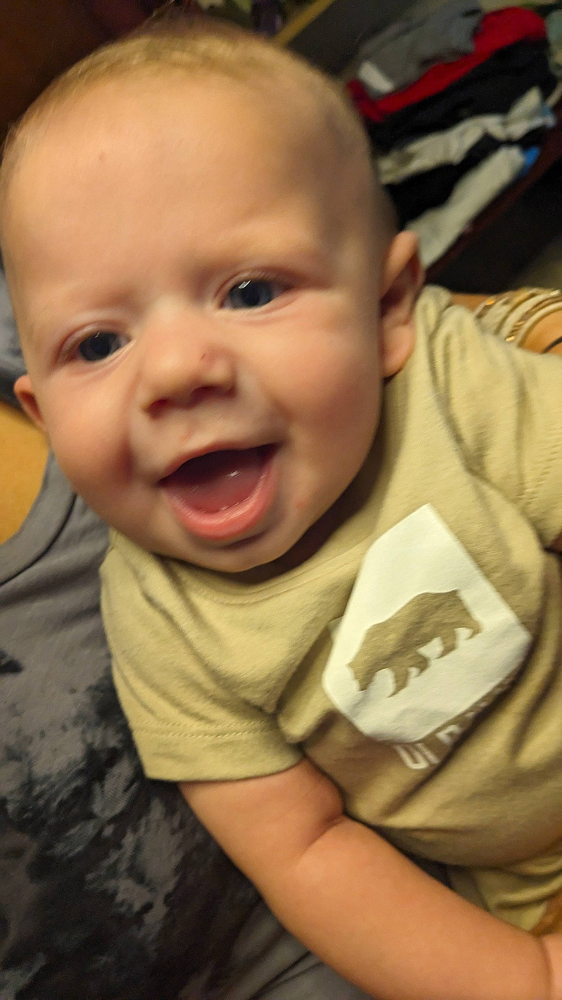 Oliver is registered to the contest to win money with this photo: baby, baby_laughing, baby_toddler_clothing, cheek, chin, comfort, cool, finger, fun, happy, human_body, iris, mouth, nose, person, skin, sleeve, smile, thumb, toddler