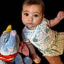 Sophia participe au concours pour gagner de l'argent avec cette photo : baby, child, clothing, curious, cute, dumbo, elephant, expression, face, hand, indoor, plush_toy, portrait, shirt, shorts, sitting, soft_toy, stuffed_animal, whale_pattern, young_child