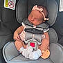 baby, newborn, car_seat, headband, pink, sleeping, pacifier, sock, infant, child, safety_harness, clothing, seat, resting, cute, indoor, person, young, adorable, peaceful