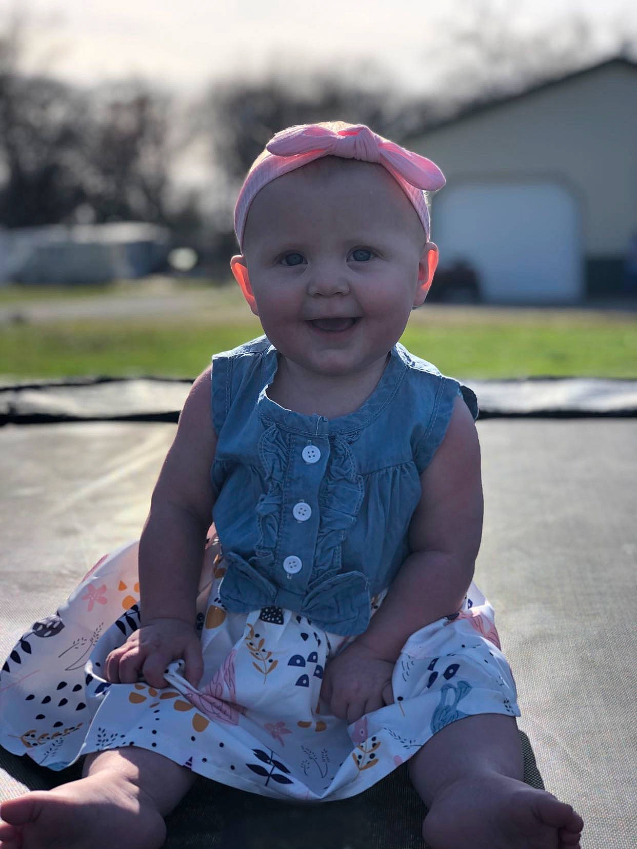 Maddyson joined the competition — help win amazing prizes! baby, baby_toddler_clothing, cap, child, fashion_accessory, fun, grass, happy, joy, leisure, magenta, pattern, person, pink, portrait_photography, recreation, sitting, sleeve, smile, t_shirt