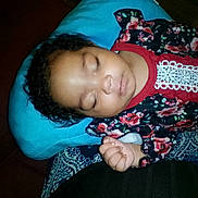 Mellissia joined the competition — help win amazing prizes! toddler, sleeping, child, face, curly_hair, blue_pillow, floral_clothing, lace, hand, blanket, patterned_blanket, indoors, resting, peaceful, portrait, baby, cute, young_child, sleep, cozy