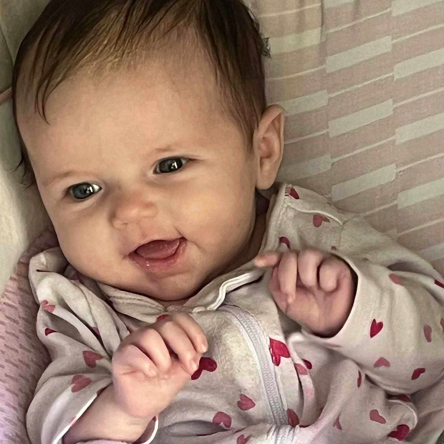 Kennidi joined the competition — help win amazing prizes! baby, child, cozy, cuddly, cute, expression, eyes, face, hands, happy, head, heart_pattern, indoors, infant, onesie, portrait, skin, smiling, soft_lighting, young