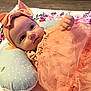 Kennidi is registered to the contest to win money with this photo: baby, headband, bow, dress, pillow, polka_dot, bee, floral_blanket, infant, cute, child, pink, peach, soft_fabric, tulle, clothing, portrait, indoors, baby_girl, hand