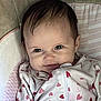 Kennidi joined the competition — help win amazing prizes! baby, infant, face, smile, onesie, hearts, clothing, cushion, seat, child, cute, portrait, indoor, comfort, soft, young, skin, hair, eyes, expression