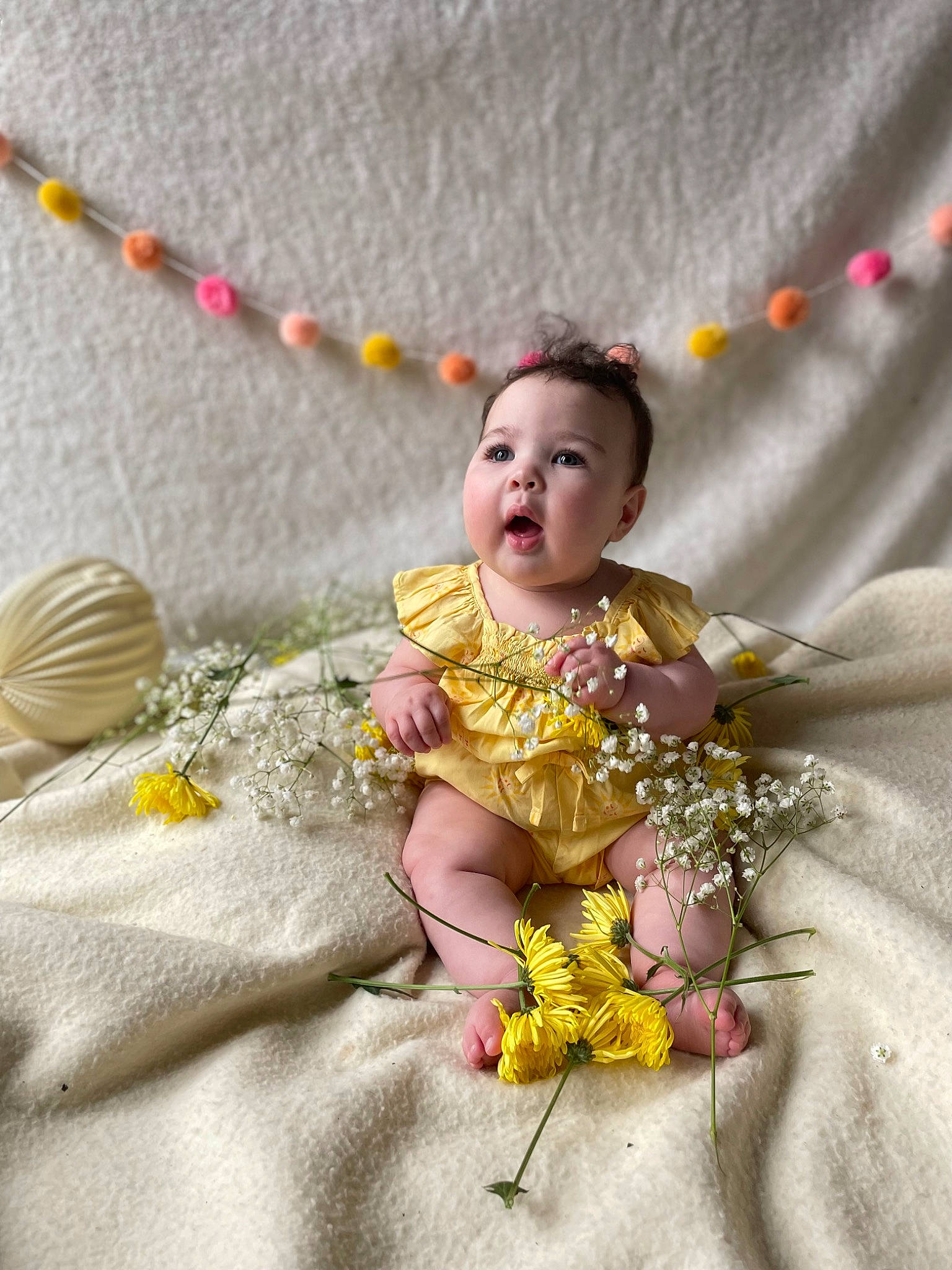 Zola joined the competition — help win amazing prizes! baby, baby_products, baby_toddler_clothing, child, fashion_accessory, fun, happy, head, headgear, jewellery, linens, pattern, person, petal, sitting, toddler