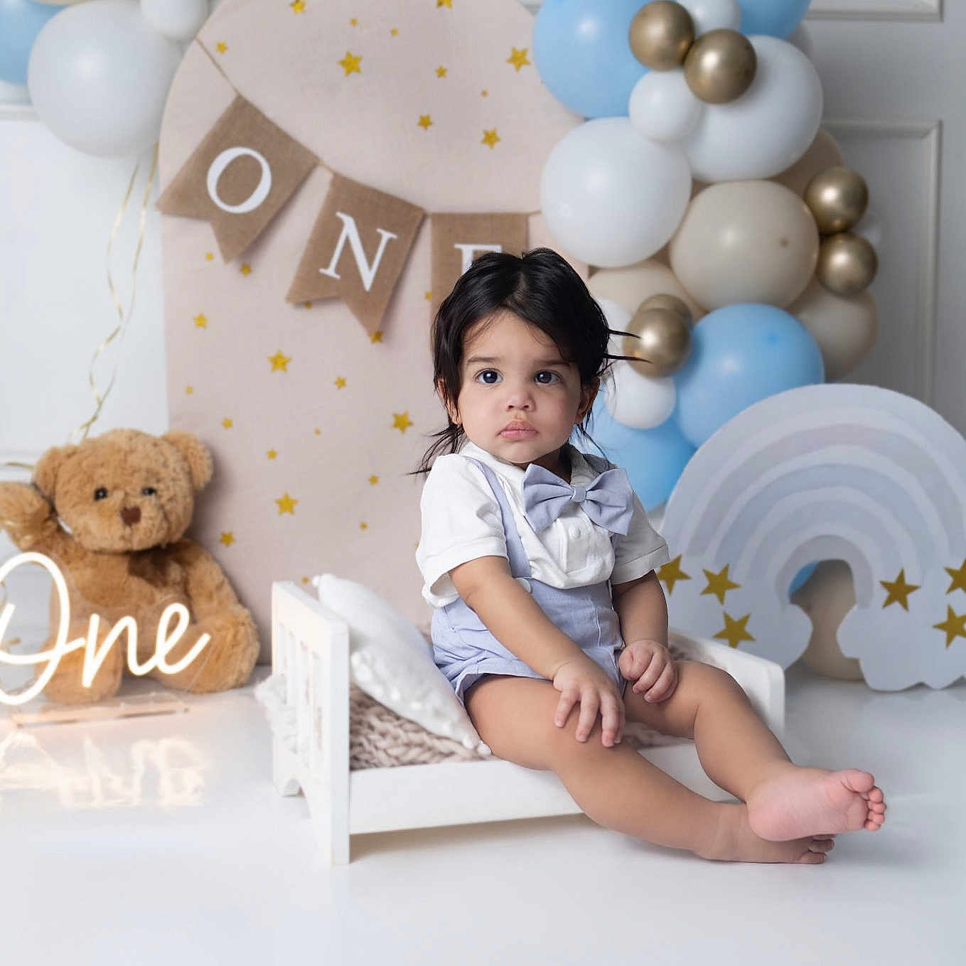 Yzael joined the competition — help win amazing prizes! baby, balloons, birthday, bow_tie, celebration, child, cute, decorations, happy, indoor, one_year_old, party, pastel_colors, portrait, smiling, stars, suspenders, teddy_bear, toddler, white_bed