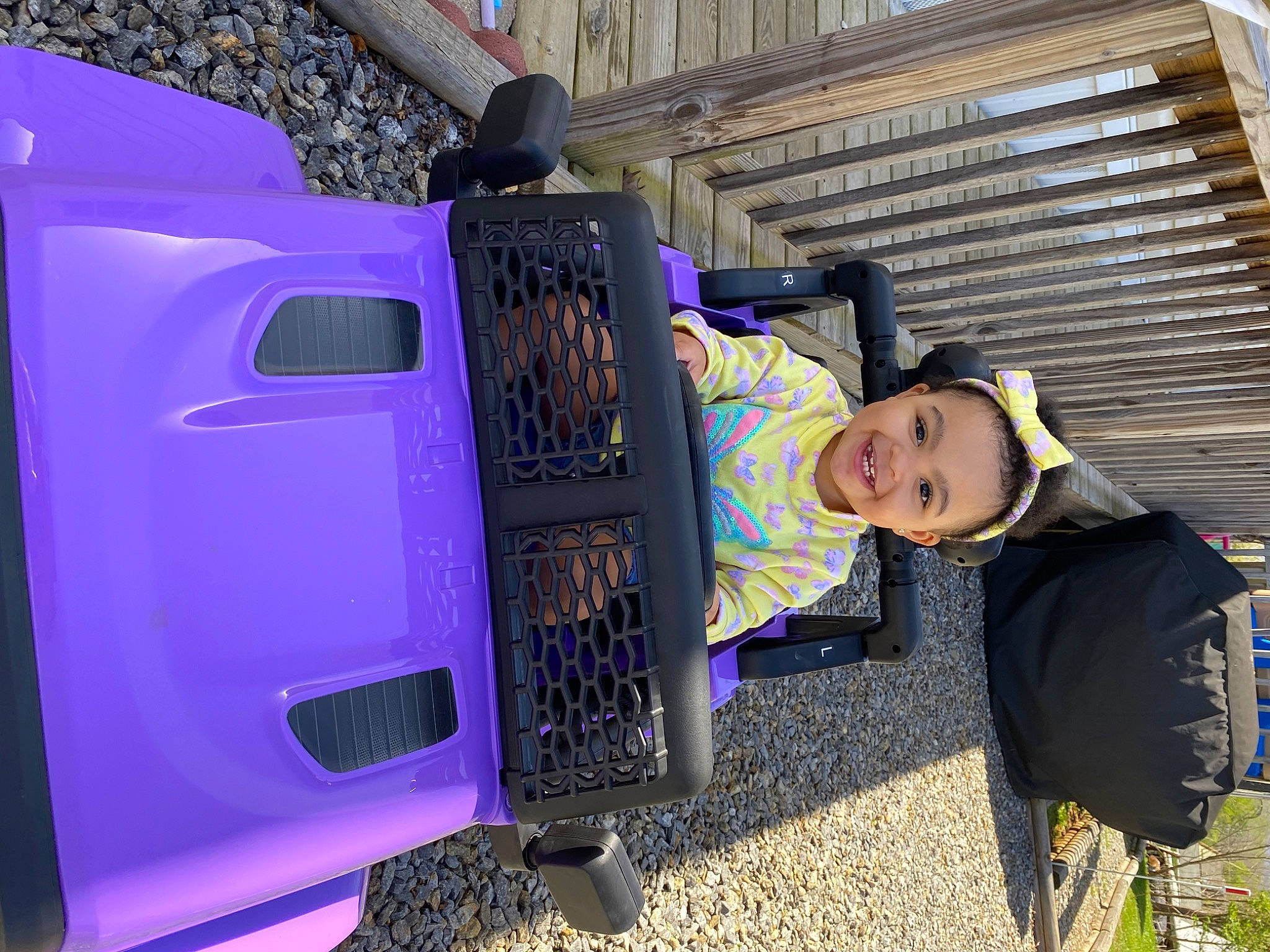 Kyliyah joined the competition — help win amazing prizes! automotive_design, automotive_exterior, automotive_tire, automotive_wheel_system, bumper, child, city, electric_blue, fun, joy, leisure, machine, magenta, motor_vehicle, office_equipment, person, purple, recreation, toddler, travel
