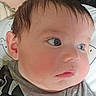 Colsen is registered to the contest to win money with this photo: baby, blue_eyes, casual_clothing, cheeks, child, close_up, curious, expression, face, hair, head, infant, looking, person, pillow, portrait, resting, shirt, skin, young