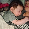 Colsen is registered to the contest to win money with this photo: adult, baby, blanket, bonding, child, closeup, clothing, comfort, cozy, cuddle, face, hair, hand, indoor, person, pillow, relax, rest, sleeping, toddler