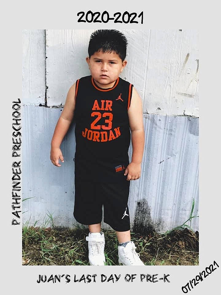 Juan is registered to the contest to win money with this photo: arm, clothing, cool, denim, face, fashion_design, flash_photography, font, grass, happy, knee, person, product, shoulder, sleeve, sportswear, standing, street_fashion, style, t_shirt