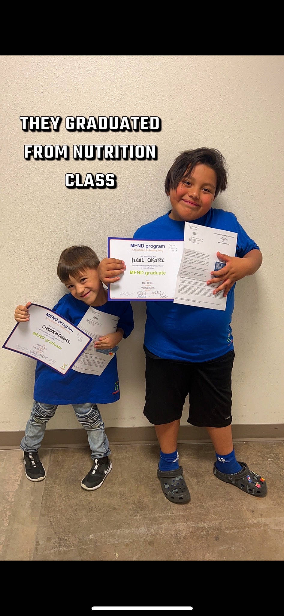 Izaac is registered to the contest to win money with this photo: advertising, child, electric_blue, event, font, footwear, fun, happy, job, joy, person, recreation, room, shoe, shorts, smile, sneakers, standing, t_shirt, team