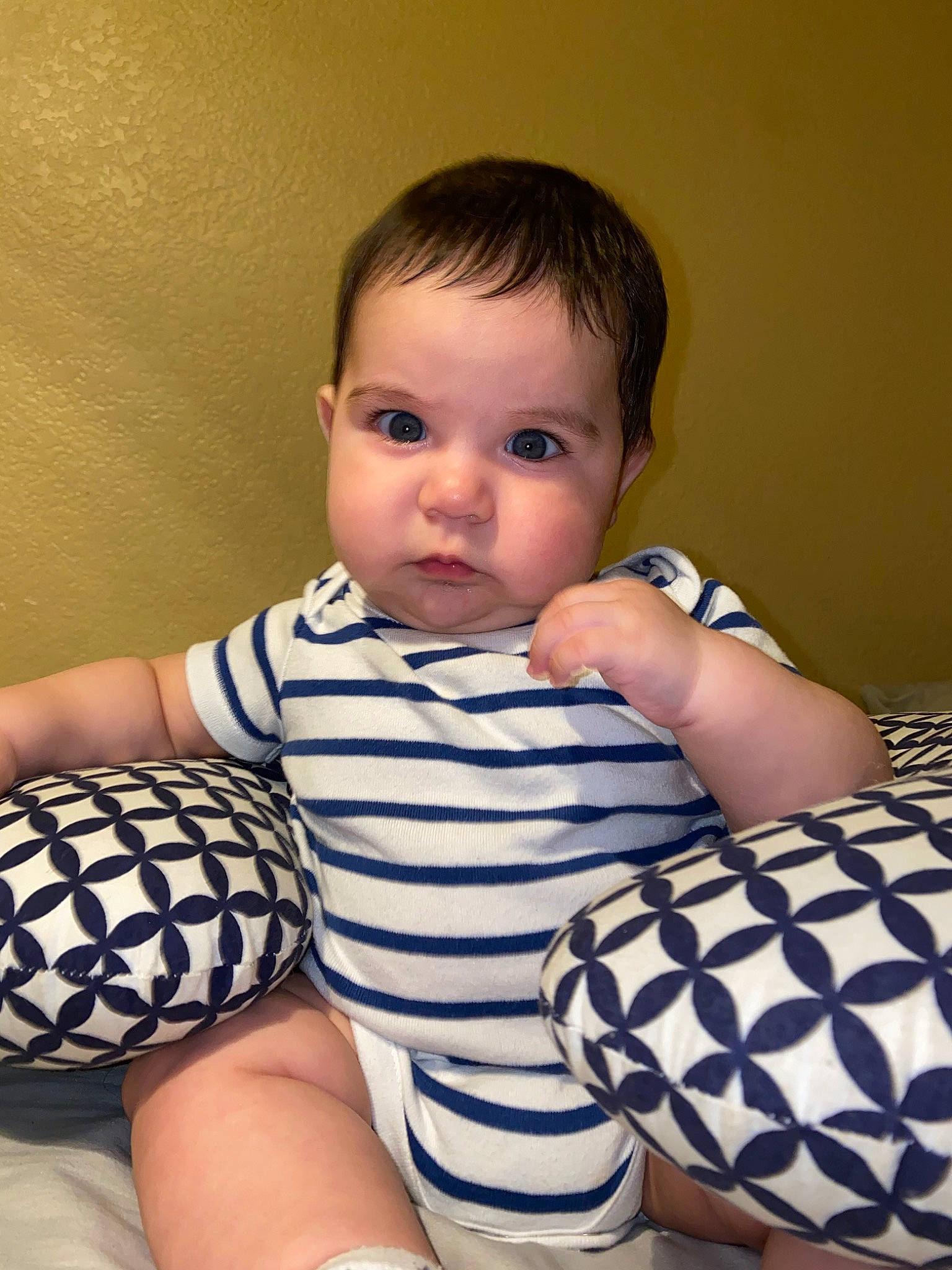 Francisco is registered to the contest to win money with this photo: baby, baby_toddler_clothing, cheek, child, finger, pattern, person, skin, toddler