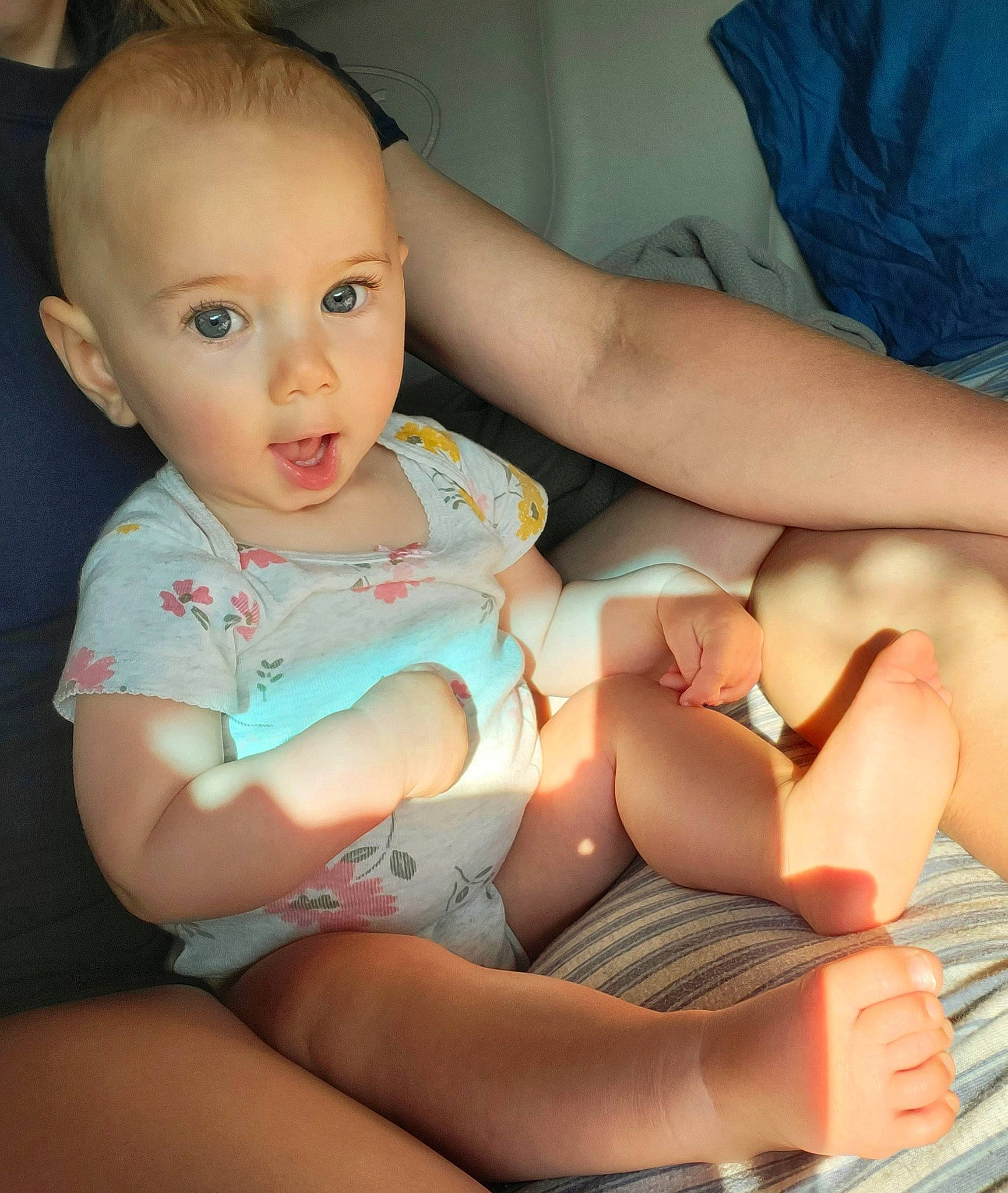 Aiyana is registered to the contest to win money with this photo: abdomen, baby_toddler_clothing, cheek, chest, comfort, finger, gesture, hand, joint, knee, lap, leg, mouth, muscle, nail, person, skin, stomach, thigh, thumb