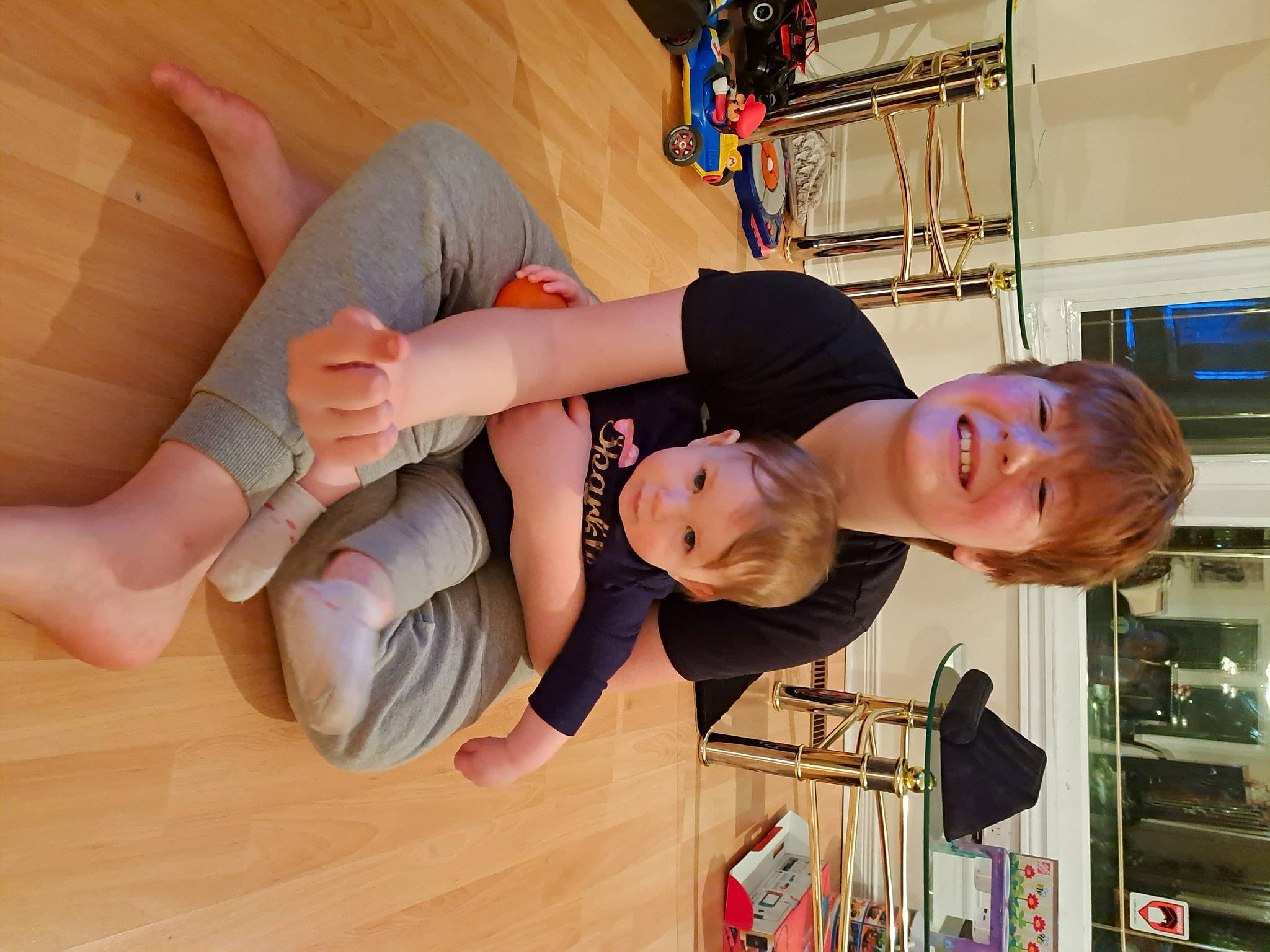 Damian joined the competition — help win amazing prizes! baby, comfort, elbow, finger, flooring, foot, fun, gesture, happy, hardwood, human_leg, joint, joy, knee, muscle, nail, person, smile, thigh, thumb
