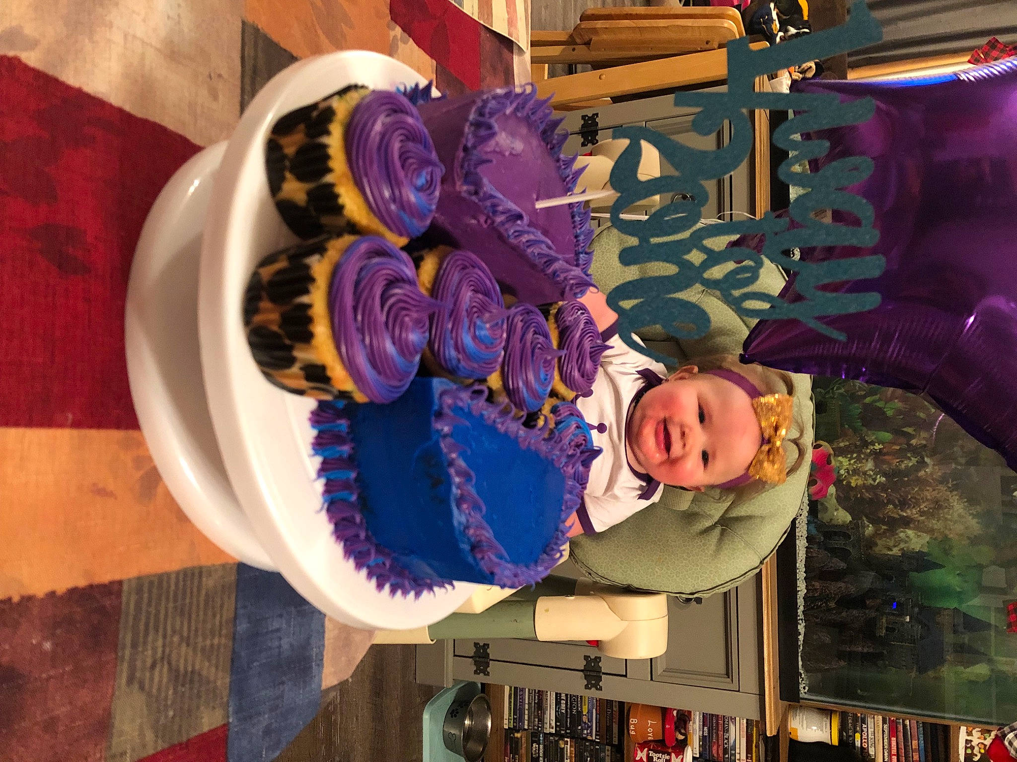 Veronica joined the competition — help win amazing prizes! amusement_ride, automotive_wheel_system, child, circle, electric_blue, event, fashion_accessory, fun, hat, headgear, headwear, joy, leisure, machine, magenta, person, purple, recreation, smile, sun_hat