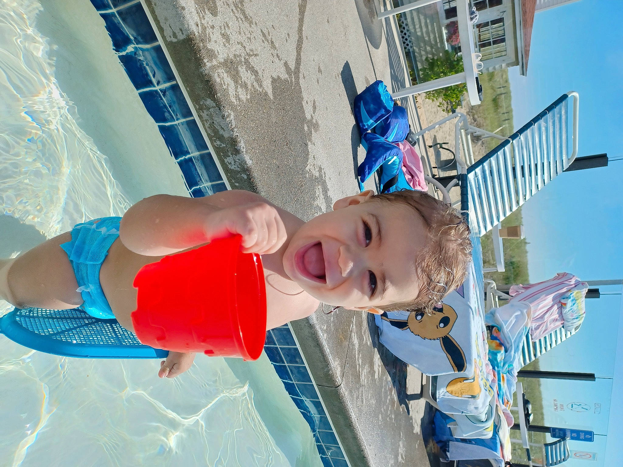 Alexi joined the competition — help win amazing prizes! azure, blue, child, elbow, electric_blue, fun, happy, hat, leisure, person, recreation, sky, smile, swimming_pool, thigh, toddler, travel, vacation, water, white