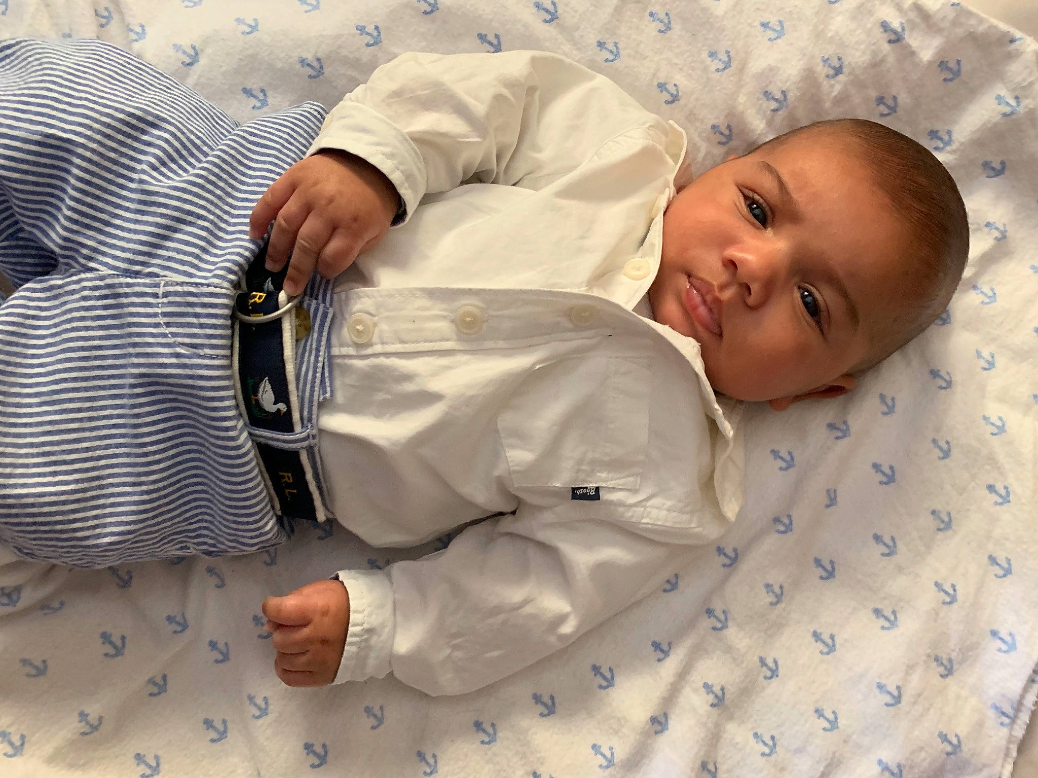 Legend is registered to the contest to win money with this photo: baby, baby_sleeping, baby_toddler_clothing, bedding, bedtime, child, collar, comfort, dress_shirt, elbow, gesture, happy, linens, pattern, person, room, sleeve, smile, toddler, white