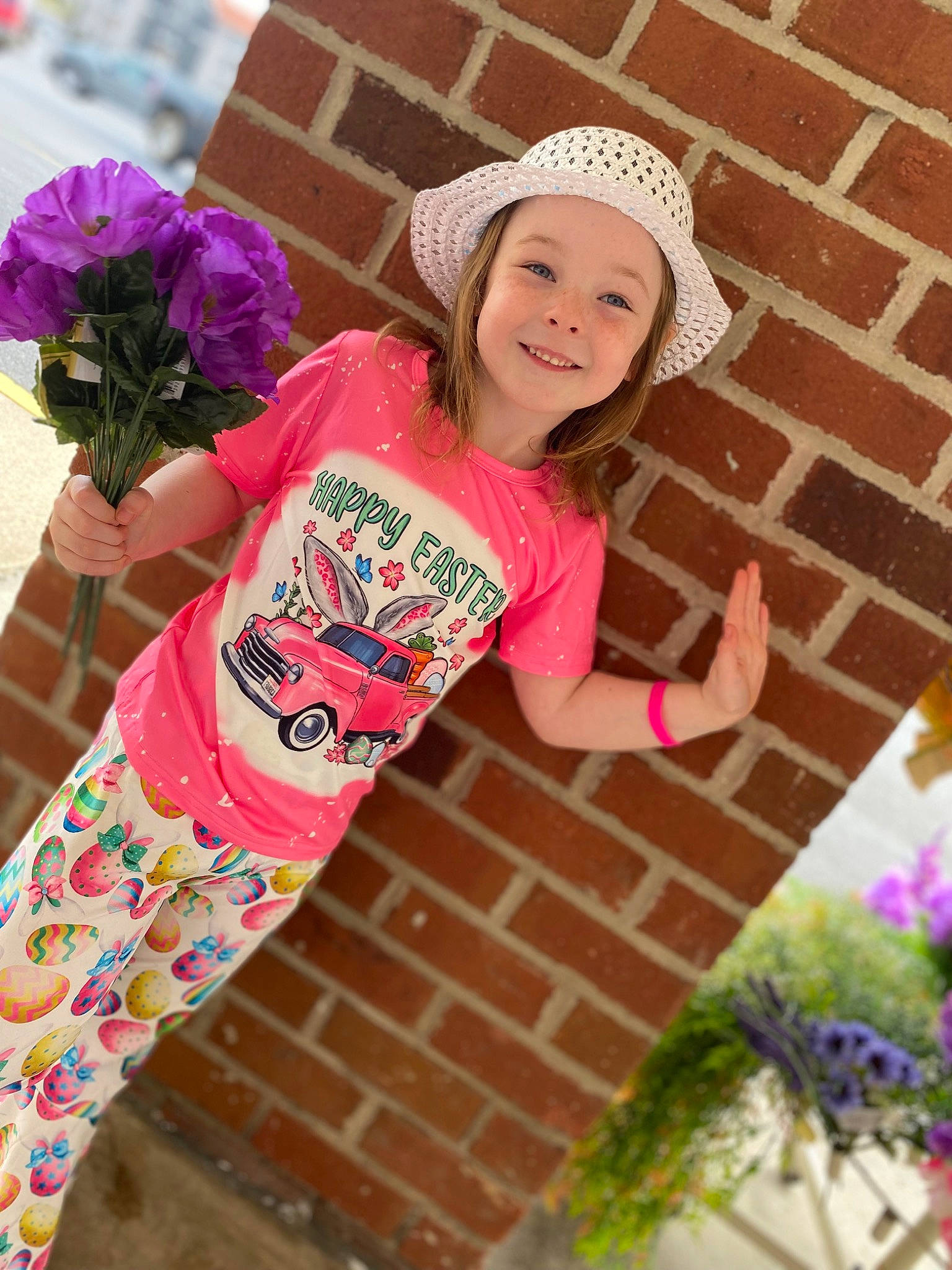 Paislee is registered to the contest to win money with this photo: beauty, cap, child, fashion_accessory, flower, fun, happy, headwear, human_leg, joy, leisure, magenta, pattern, peach, person, pink, plant, sleeve, smile, t_shirt