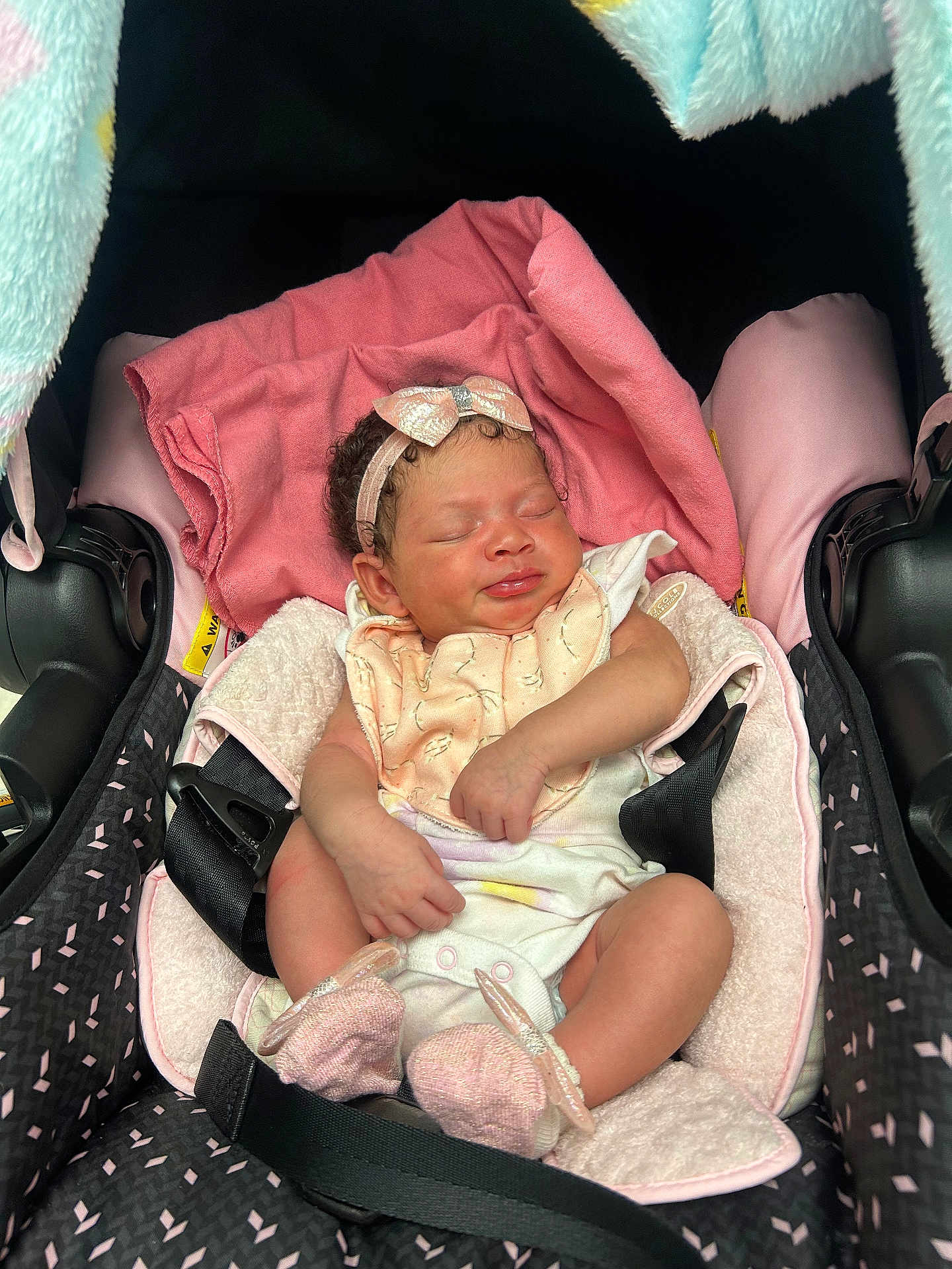 Kloei joined the competition — help win amazing prizes! baby, infant, car_seat, blanket, headband, pink, sleeping, clothing, footwear, strap, child, newborn, cute, soft, rest, indoors, comfort, accessory, seat, peaceful