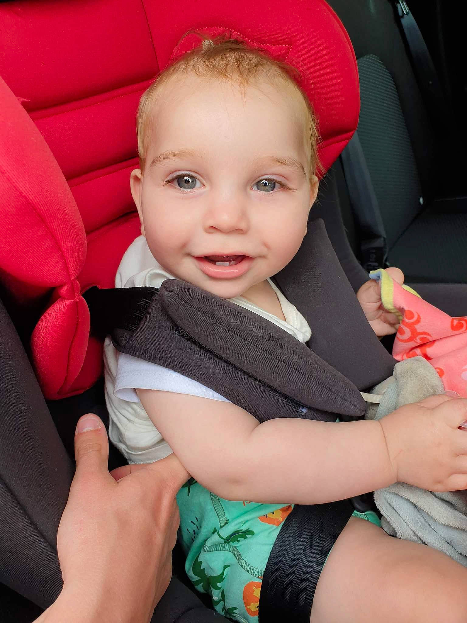 Devon Caillaux participe au concours pour gagner de l'argent avec cette photo : baby_toddler_clothing, car_seat, car_seat_cover, comfort, dress, finger, gesture, hairstyle, hand, head, human_body, joy, lap, leg, person, product, seat_belt, skin, smile, thigh