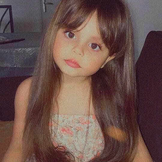 Mila a rejoint le concours — aidez-le/la à gagner de superbes lots ! bangs, black_hair, cheek, chin, cool, doll, dress, eyebrow, eyelash, forehead, human_body, iris, jaw, layered_hair, lip, neck, nose, shoulder, skin, toy