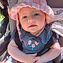 baby, child, hat, sunhat, stroller, blue_outfit, embroidery, birds, flowers, hands, clasped_hands, cute, curious, natural_light, outdoor, seatbelt, comfort, infant, face, portrait